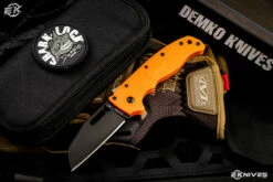 Demko Knives AD20.5 Shark Foot Shark Lock Folding Knife Orange Grivory 3″ Black DLC